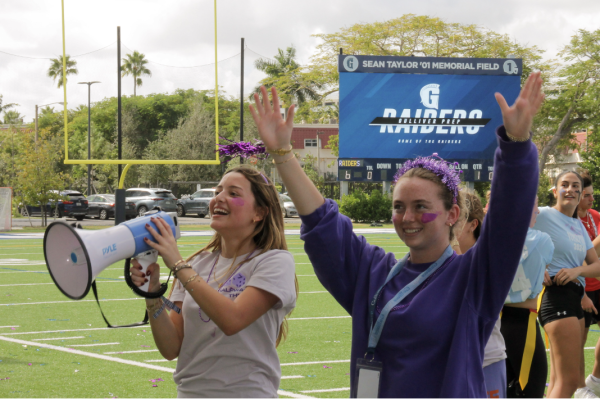 Sophomores Ana Luiza Fortuna De Oliveira and Kennedy Feldman energized the crowd while the teams prepared their play. Senior Zoe Gross participating in the game additionally helped them excite fans. The grades came together in support of one another, which started the new Powderpuff tradition on a good foot.